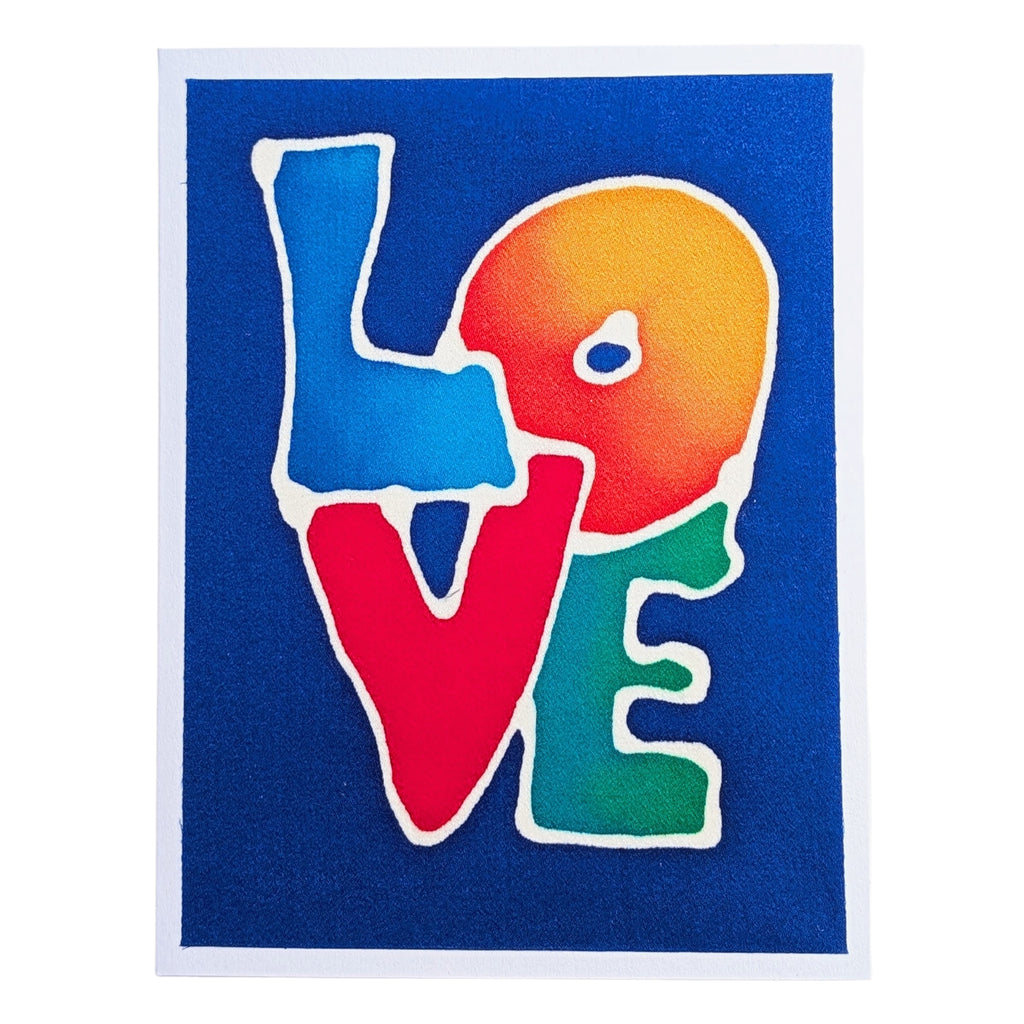A hand painted pure silk original art card featuring the word LOVE in large colorful letters outlined in white on a dark blue background, with a white border around the print.
