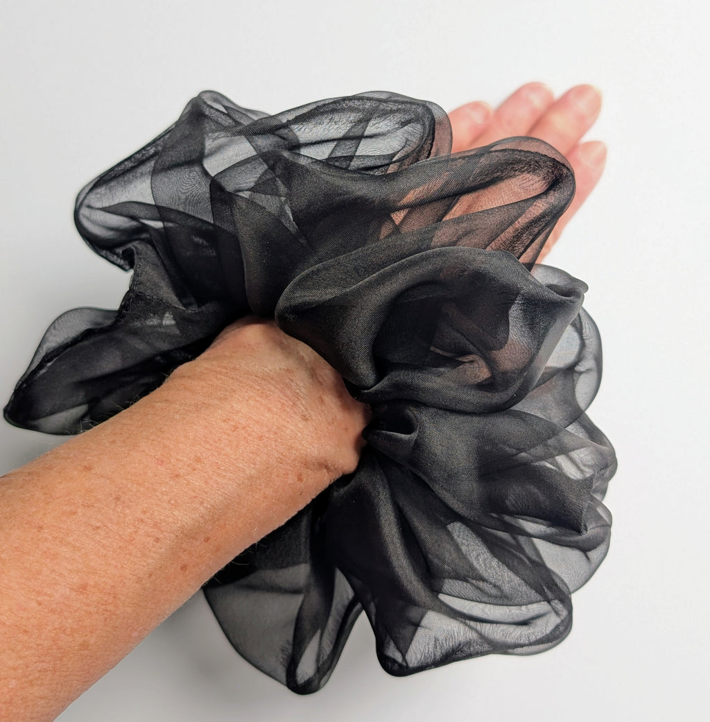 A pure silk oversized jumbo large black sheer organza hair scrunchie