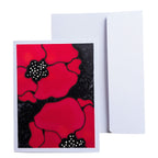 A2 SIZE HAND PAINTED PURE SILK ORIGINAL ART CARD greeting card with a bold poppy design in red and black, shown in front of a plain white envelope on a white background.
