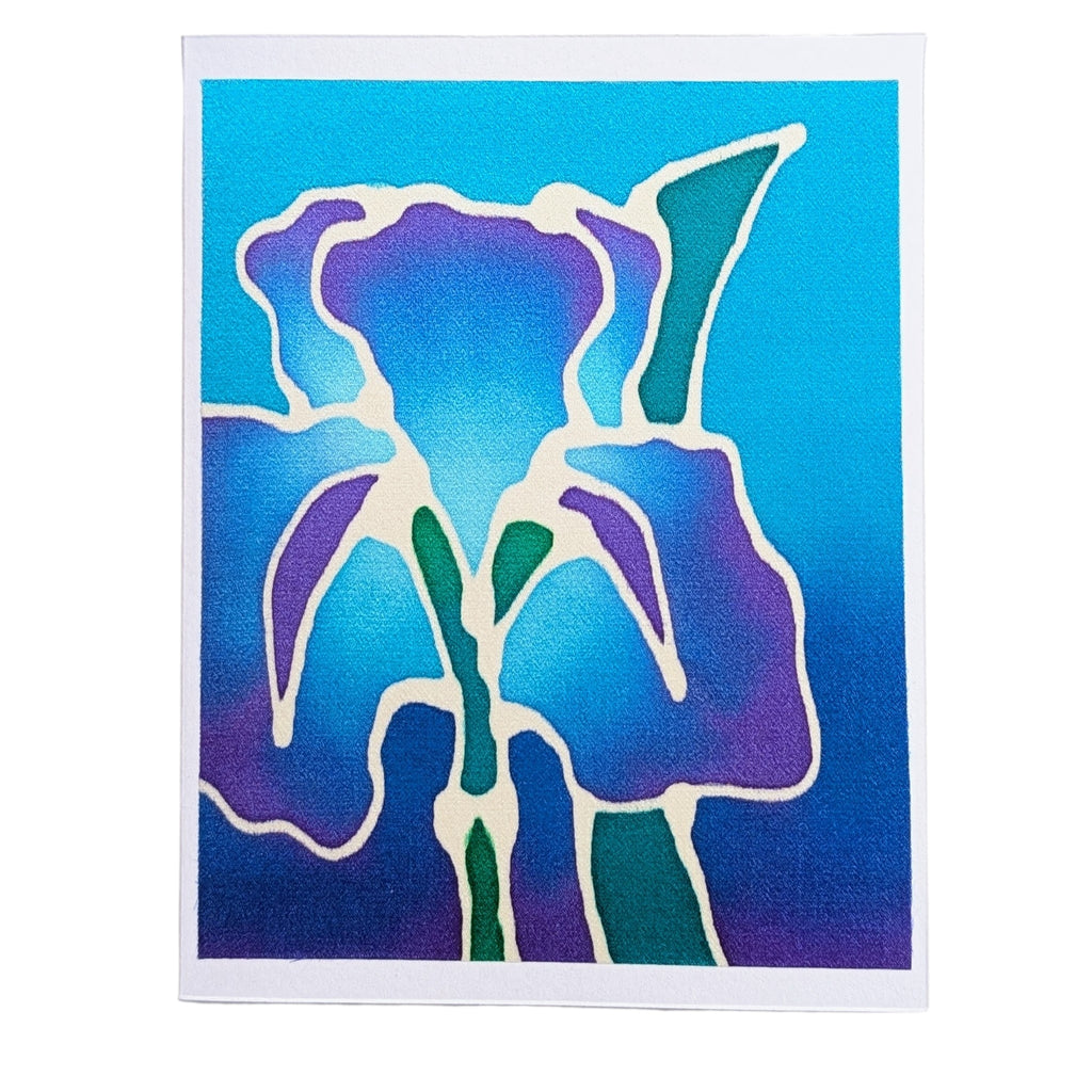 A hand painted pure silk original art card greeting card  featuring a stylized iris flower with purple and teal petals outlined in white, set against a blue gradient background.