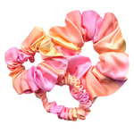 Load image into Gallery viewer, pure silk scrunchie hair accessory ponytail holder hand dyed orange pink color handmade by Lynne Kiel
