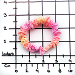 Load image into Gallery viewer, skinny size pure silk scrunchie ponytail holder hair accessory hand dyed orange pink color handmade by Lynne Kiel
