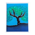 Apure silk hand painted original art card featuring a stylized tree with a black trunk and branches, a green and blue textured canopy, and a dark blue ground