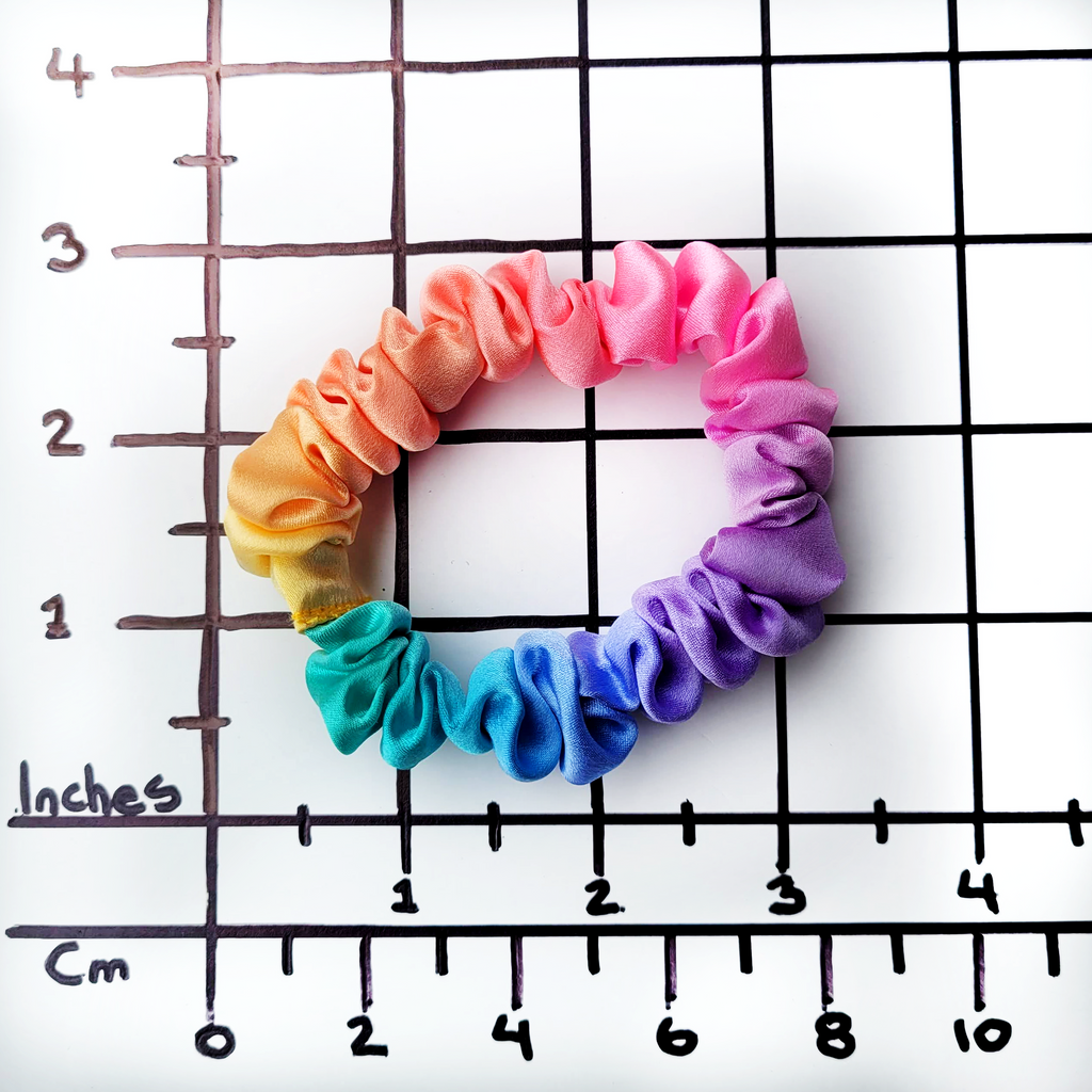 Skinny scrunchie ponytail holder rainbow color hand dyed pure silk handmade by Lynne Kiel