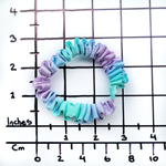 Load image into Gallery viewer, skinny scrunchie pure silk hair accessory ponytail holder hand dyed purple bue green color handmade by Lynne Kiel
