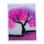 A hand painted pure silk original art card greeting card featuring a stylized black tree silhouette with a vibrant pink and purple bubble-like canopy against a pale gray background,