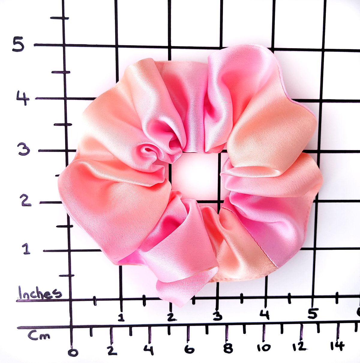 pastel orange and pink hand dyed silk scrunchies ponytail holder hair ties handmade by Lynne Kiel