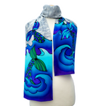 Load image into Gallery viewer, ocean waves blue silk scarf hand painted mermaid tail art design handmade by Lynne Kiel
