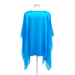 Load image into Gallery viewer, Turquoise blue pure silk poncho top one size for ladies back view handmade by Lynne Kiel
