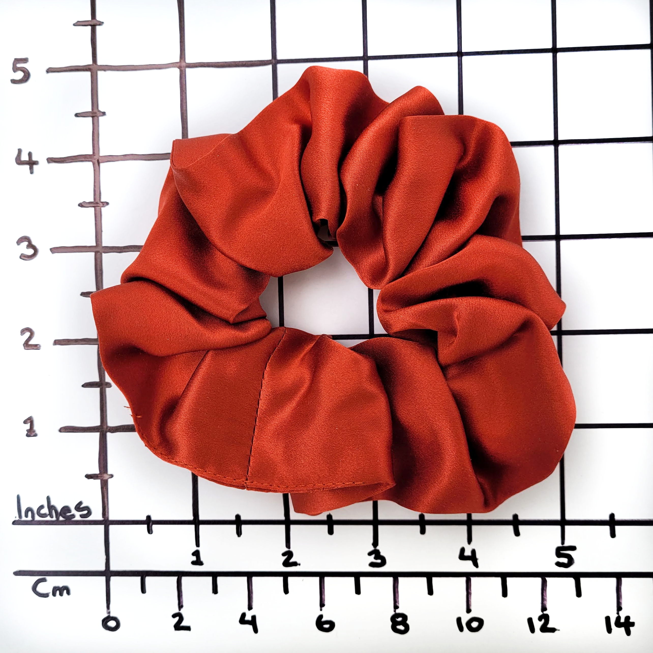 pure silk medium size scrunchie hair tie rust orange color handmade by Lynne Kiel