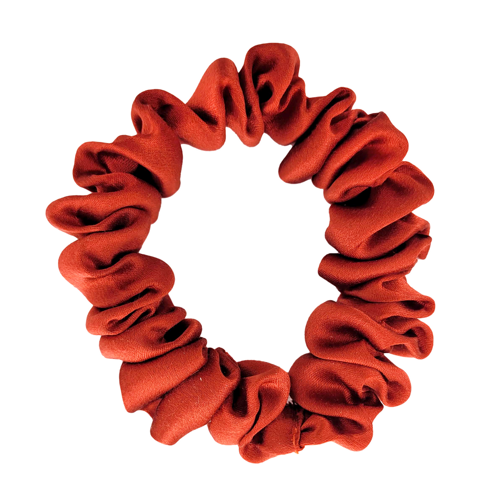 Pure silk Skinny scrunchie hair tie for pony tail  rust orange color handmade in Canad by Lynne Kiel