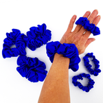 Load image into Gallery viewer, blue silk scrunchie hair accessory for yoga and gymnastics and sleeping
