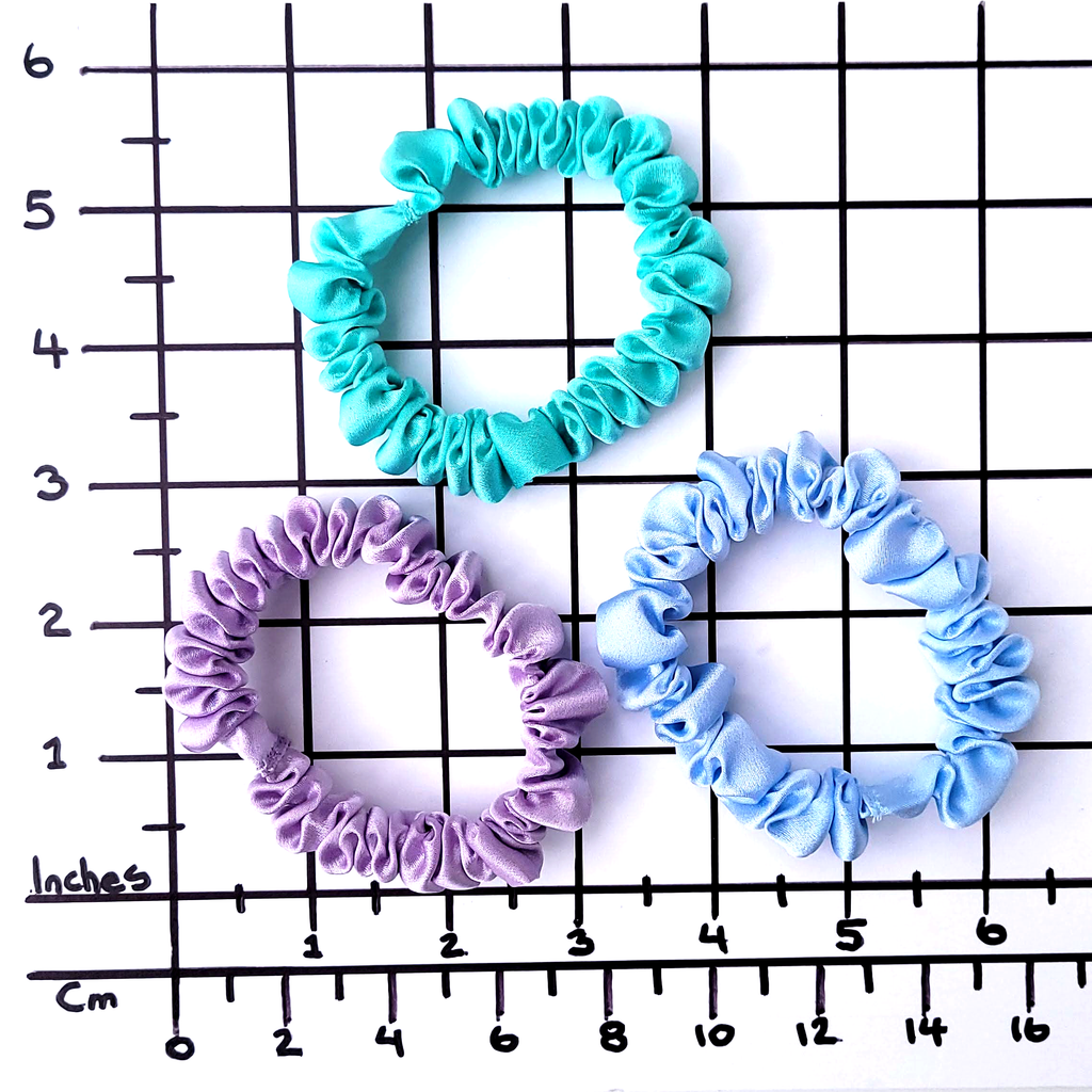 Silk skinny scrunchie hair accessory handmade by Lynne Kiel green purple blue colors